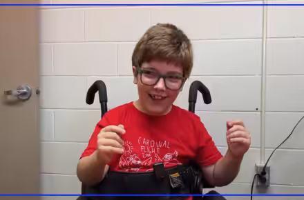 Sylvania second grader pursues sports reporting dream despite cerebral palsy